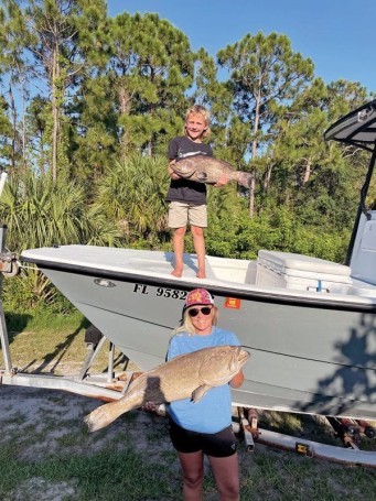 Brantley and Kaytlyn, Reef  Affliction Fishing Team, slaying the grouper out  of Sebastian Inlet.