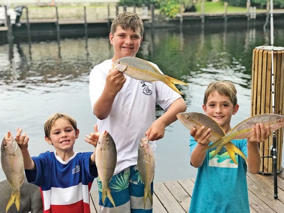 Jayden, Grant and Westin with some nice yellowtail snappers