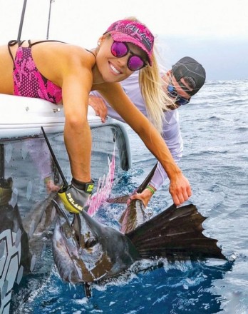 Capt. Mark DiDario of Father and Son Sportfishing put Allison Renn from Jacksonville on her first sailfish.