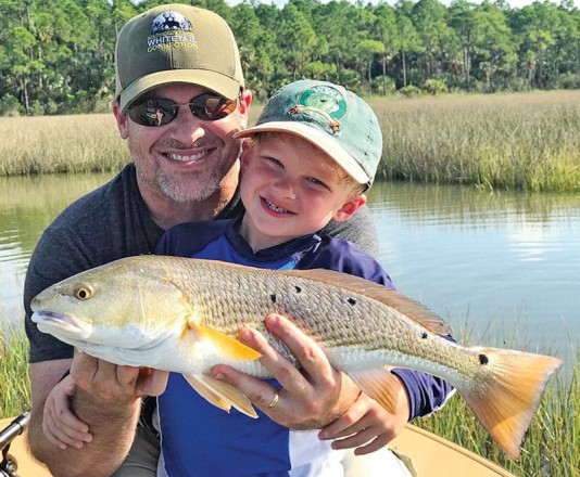 Henry Hatch, 5, with his first ever redfish!