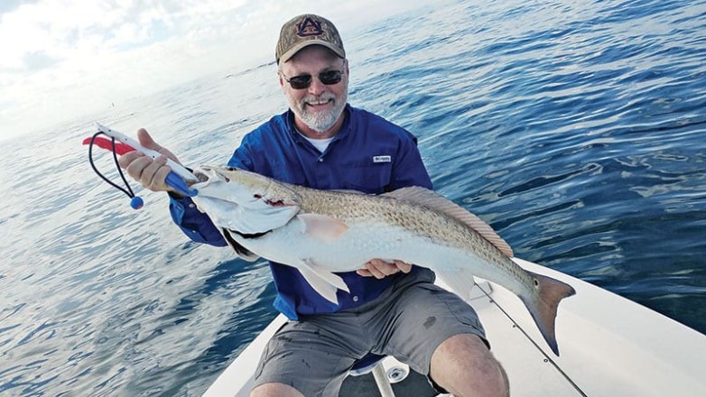 Jody was all smiles after finally landing his first ever redfish!
