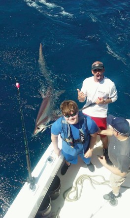 Josh with a huge thresher shark