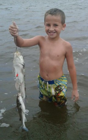 Eight year old robert Anderson junior with double catfish catch on shrimp at North end Indian River Lagoon