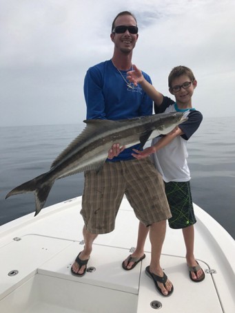 Eric and Mason Ochipa with a very nice Cobia caught out of Sebastian on a swim bait , this was young Masons first Cobia Congratulations