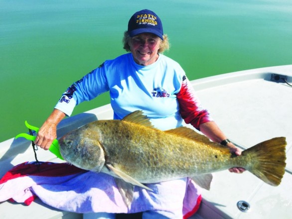 Becky Beatty w/ a nice drum on a jig tipped w/ shrimp.