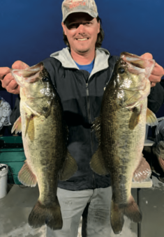Sean Cunningham with 2 nice St Johns River bass, one of the was Big Bass for Jolly Gator Bass Series event