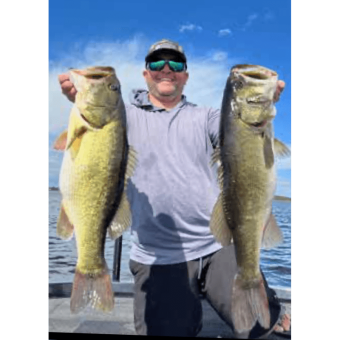 Josh Wolf with 2 9lb plus Monsters from Lake Toho