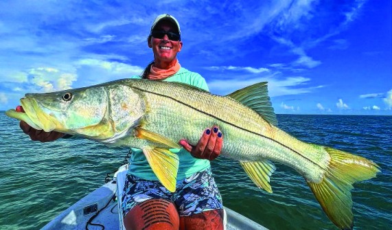 Amy Lockhart, military vet, with a nice snook.