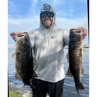 Josh Wolf with a nice pair of bass from St Johns River in Palatka area
