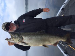 Ed Dyer with a surprise King Salmon caught during the Mid State Bass Classic on Muskegon Lake