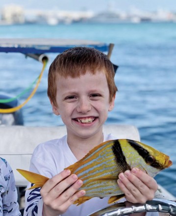 7 year old Frankie Prieto caught his first porkfish on a live shrimp.