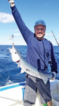 Arthur Tukh of SeaUSmile Lures with a solid barracuda