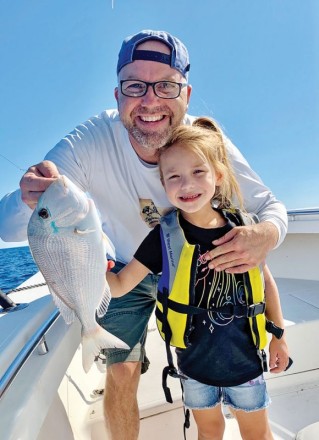 Six year old Brynn Mechler caught a beautiful porgy while fishing with her dad.