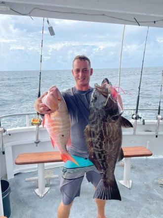 This angler doubled up with a mutton snapper and a black grouper with the Fishing Headquarters crew