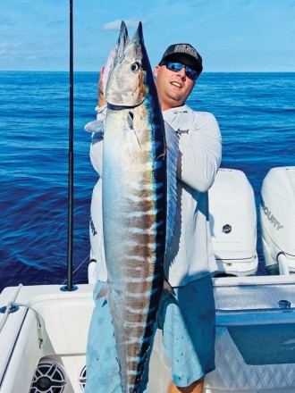 Sean Parker with  a solid Bahamas high speed wahoo.