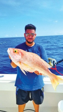 Kenny from Carl's Bait and Tackle with a nice yelloweye snapper