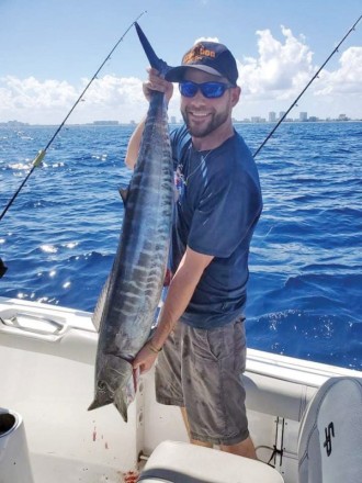 Matt Gonzalez with a nice wahoo caught right out front on a planer