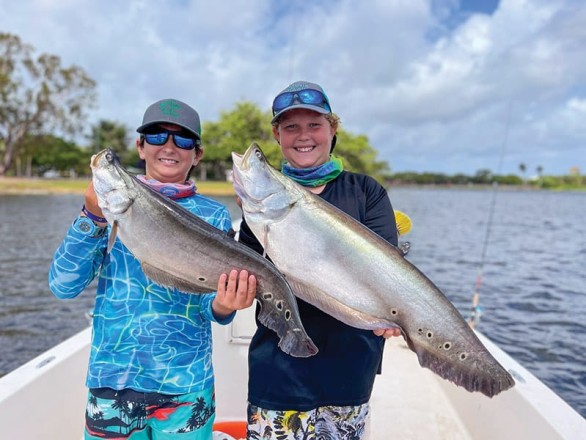 Johnny and Denton doubled up on clown knifefish for Denton’s 13th birthday fishing trip with South Florida Sportfishing