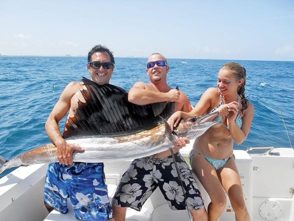 Ali caught her first sailfish with Team Nice Racks.