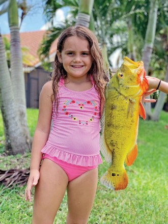 Six year old Sophia Dalton caught her first peacock bass while fishing with her Aunt Michelle