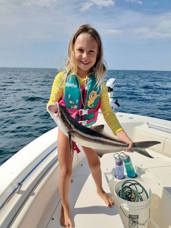 Ryan Caravello brought in a hefty Brevard grouper, and daughter, Camille, a nice cobia catch!