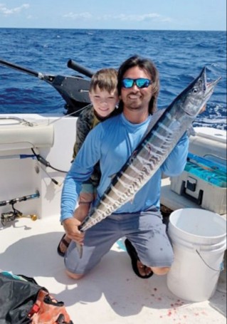 Derek McQuaig caught this wahoo with planers and islander lures slow trolling along weed line.