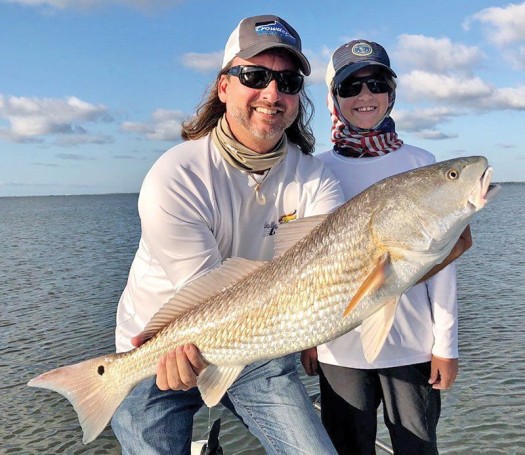 David and his son Tyler hooked this nice redfish in the Mosquito Lagoon with Capt. Travis Tanner.