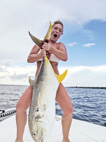 Elisa battled this monster jack crevelle for 45 minutes in the Indian River. Caught on a live hoglegs mullet. What a beast!