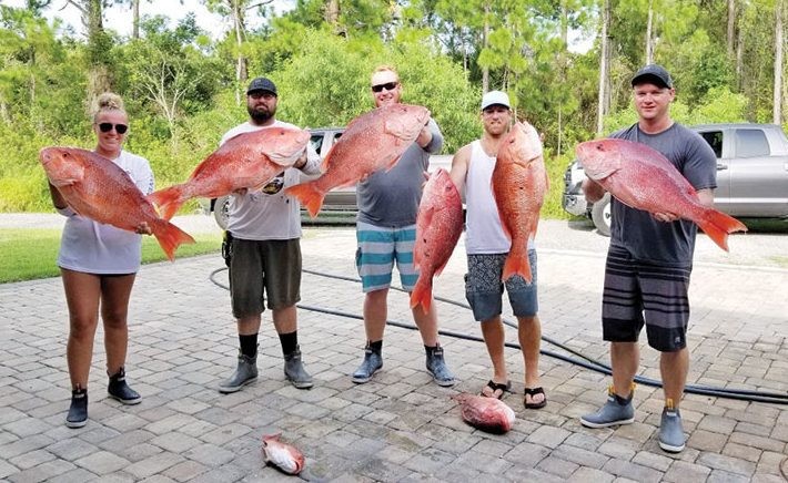 Kaytlyn, Ronnie, Keith, Matson and Brandon had a fine day catching  their limit of red snapper.