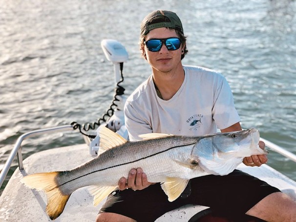 Justin Manna caught this respectable snook in the Port from his new 16-ft. Carolina Skiff using a live threadfin herring/greenie. He has a lot of respect for this fish and provided him with a quick release back.