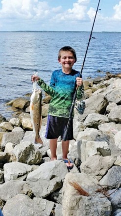 8 year old Devon Johsnston with a nice Destin red. His mission accomplished!