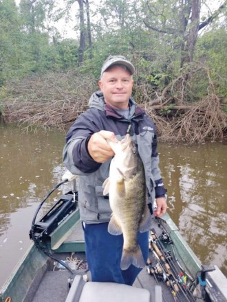 Aaron with a nice Flint River shoal bass.