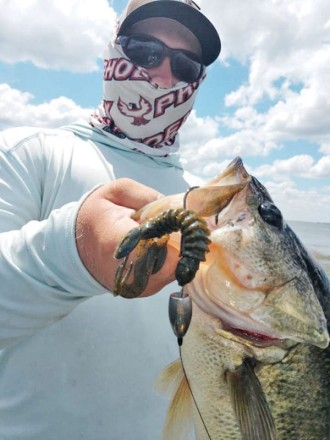 CJ Lockamy learning quickly how to punch mats for Seminole bass in C-note’s Bass Class.