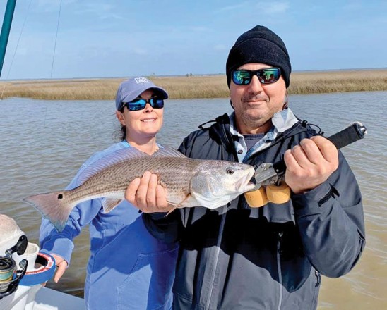 Dan & Jessica Susich duked it out on Capt. Kens boat. Tough conditions but caught Redfish!