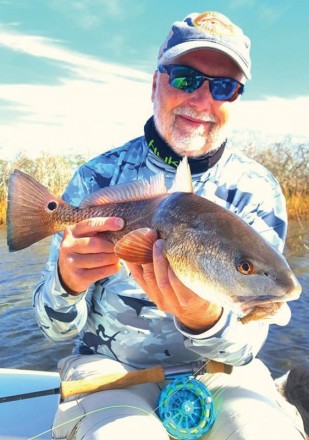 Eric Nelson, owner of Southern Cleaning Supply, convinced this red to inhale a crab pattern at 40 feet with Capt. Steve Bachman of Panama City Inshore.