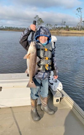 Here’s Brayden Sullivan braving the wind and cold for some redfish action!