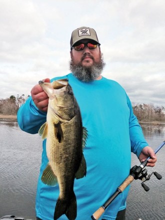 Jason from KY on a guided Seminole bass trip with C-note Charters