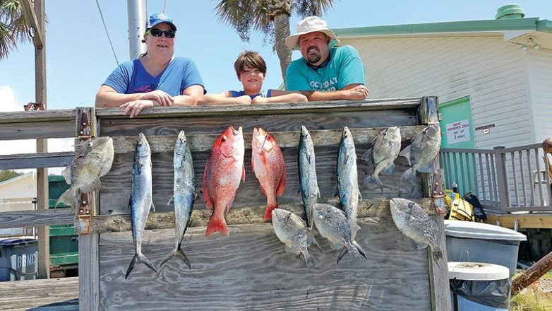 Jennifer, Clayton and James getting it done aboard the C-note boat.