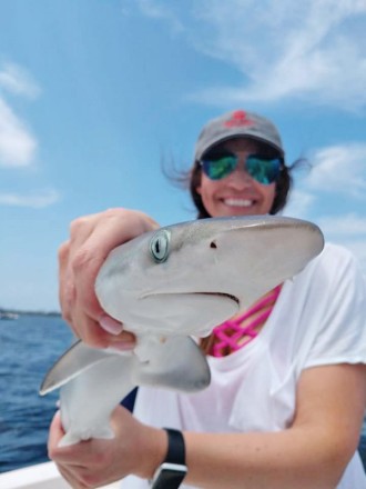 Laura picking on sharks in the bay...