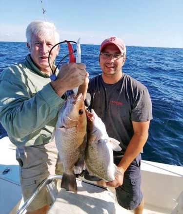 Mike and Ash doubled up with some nice black snappers aboard the C-note boat.