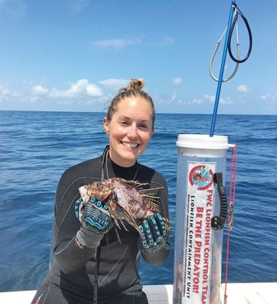 Nikkie Cox with a tagged lionfish off Franklin Co.