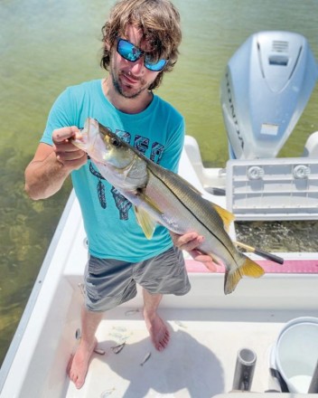 Ryan from TN caught & released this snook aboard Reel Rosie Inshore Charters in St. Andrews Bay.