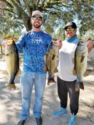 Tyler Suddarth and Steve Young with their 3-fish limit weighing in at 13 pounds of Seminole bass winning this West Side Team Trail event.