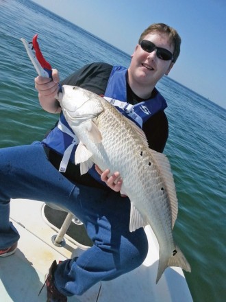 Austin with the biggest fish he’s ever caught!