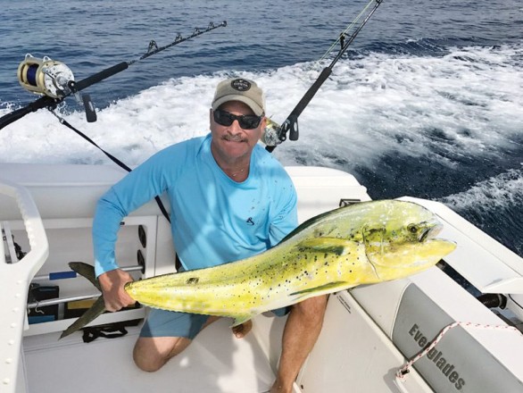 Ed Federkeil with a big cow dolphin.