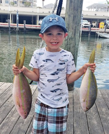 Jayden with a nice pair of yellowtails