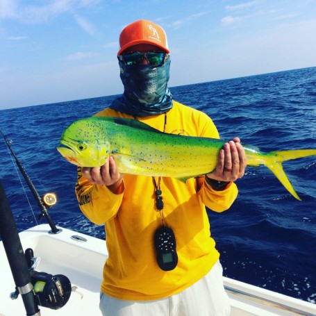 Robert Brennen catching only his second mahi out of port canaveral on a naked ballyhoo in 200' of water with William hawley