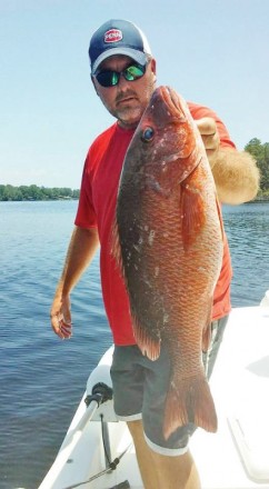 Capt. Jason with a nice black snapper