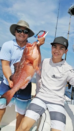 Vu and Ryan Au from Tucson enjoying an epic day aboard the C-note boat