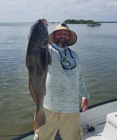 Landon Wells with a 17 lb 34 inch black drum caught in the Banana River in Cocoa